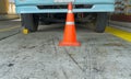 Front truck with wheels stopper, No movement car with traffic cone during goods loading