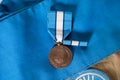 Front of UN Peacekeeper`s medal and service ribbon