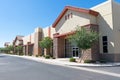 Front of a vacant commercial building with entrances