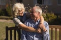 Senior couple embracing each other in the park Royalty Free Stock Photo