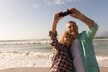 Senior couple taking selfie with mobile phone on the beach Royalty Free Stock Photo