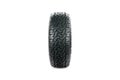 Front view of an all terrain tire designed for use in all road conditions.