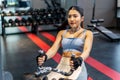 Front view of Asian women doing exercises in fitness, exercises to strengthen muscles and strength, lose body fat burning,