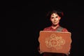 View of attractive steampunk woman using laptop isolated on black