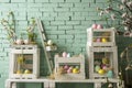 Front View Backdrop with Brick Wall, White Wooden Crates, Tulips, and Ladder. Royalty Free Stock Photo