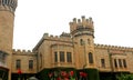 A front view with battlement towers of bangalore palace with creeper plant. Royalty Free Stock Photo