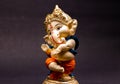 Front view of beautiful ganesha statue on blurry background. traditional concept