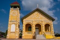 The front view of the beautiful small church on blue sky background