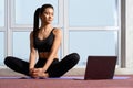 Yoga instructor streaming online yoga class. Royalty Free Stock Photo