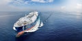 Front view of a big LNG tanker ship traveling with full speed over the ocean Royalty Free Stock Photo