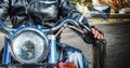 front view of biker and motorcycle in hdr