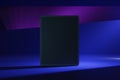 Front view on blank black digital tablet screen with space for your logo or text on abstract graphic dark blue and purple shades Royalty Free Stock Photo