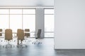 Front view of blank wall with empty space for image frame or poster on empty modern conference room, with window, office Royalty Free Stock Photo