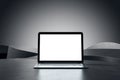 Front view on blank white modern laptop monitor with place for your logo or text on abstract concrete surface and grey background