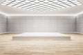 Front view on blank white podium with place for your product or car presentation on wooden floor in abstract hall with light wall Royalty Free Stock Photo