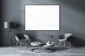 Front view on blank white poster in black frame on dark wall background in stylish grey shades living room with vintage lamp, Royalty Free Stock Photo