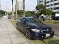 Front view of a blue color BMW M5 in Lima Royalty Free Stock Photo