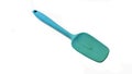 front view of a blue small silicone spatula isolated on white background. versatile kitchen utensils Royalty Free Stock Photo