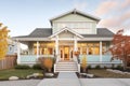 front view of cape cod house with modern twostory extension