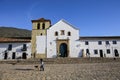 Front view of the Church of our Lady of the Rosary at Plaza Mayor of Villa de Leyva, against blue sky, Colombia