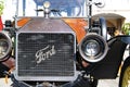 Front view of an old Ford Car.