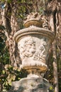 Carved, stone vase of a stone pedestal Royalty Free Stock Photo