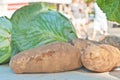 potatoes and cabbage heads on display and for sale Royalty Free Stock Photo