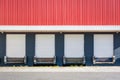 Front view of closed truck loading docks at a warehouse Royalty Free Stock Photo