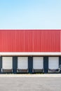 Front view of closed truck loading docks at a warehouse Royalty Free Stock Photo