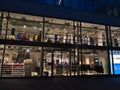 Closed Zalando outlet store, mainly selling shoes and clothing, in downtown with illuminated shop windows during lockdown.