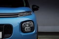 Car LED Headlights and Fog Lights of a blue SUV Royalty Free Stock Photo