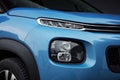 Car exterior: LED Headlights and Fog Lights of a blue SUV Royalty Free Stock Photo