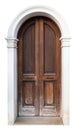 tall vintage brown wooden door with classic marble stone pattern archway isolated on white Royalty Free Stock Photo