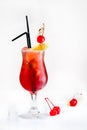 Front view of cold fresh tropical red cocktail in a tulip glass Royalty Free Stock Photo