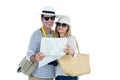 Front view of couple reading map Royalty Free Stock Photo