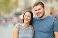 Front view of a couple walking on the street Royalty Free Stock Photo