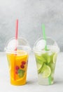 front view cups with soft drinks straws. High quality photo