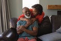 Senior couple having fun in living room Royalty Free Stock Photo