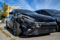 Front view of damaged black car after accident Royalty Free Stock Photo