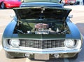 Front view of dark green antique Chevy Camaro Royalty Free Stock Photo