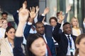 Diverse business people asking question during speech in conference room Royalty Free Stock Photo