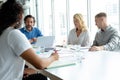 Business people discussing with each other in meeting at conference room in a modern office Royalty Free Stock Photo