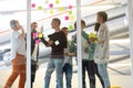 Business people discussing over sticky notes in the office Royalty Free Stock Photo