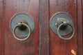 Vintage rusty doorknob on wooden classic door Royalty Free Stock Photo