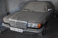 Front view of Dusty and forgotten classic mercedes-benz w201 in garage in Algiers, Algeria, November 12, 2017