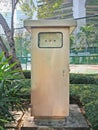 Front view, Electrical metal cabinet in park Royalty Free Stock Photo