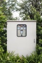 Front view, Electrical metal cabinet in public park. Royalty Free Stock Photo