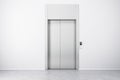 Front view on elevator with metal doors, white blank wall and concrete floor. 3D rendering, mockup Royalty Free Stock Photo