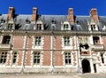 Entrance and flamboyant Gothic facade of the royal castle of Blois Royalty Free Stock Photo