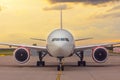 Front view exactly of a wide-body aircraft sunset at the airport Royalty Free Stock Photo